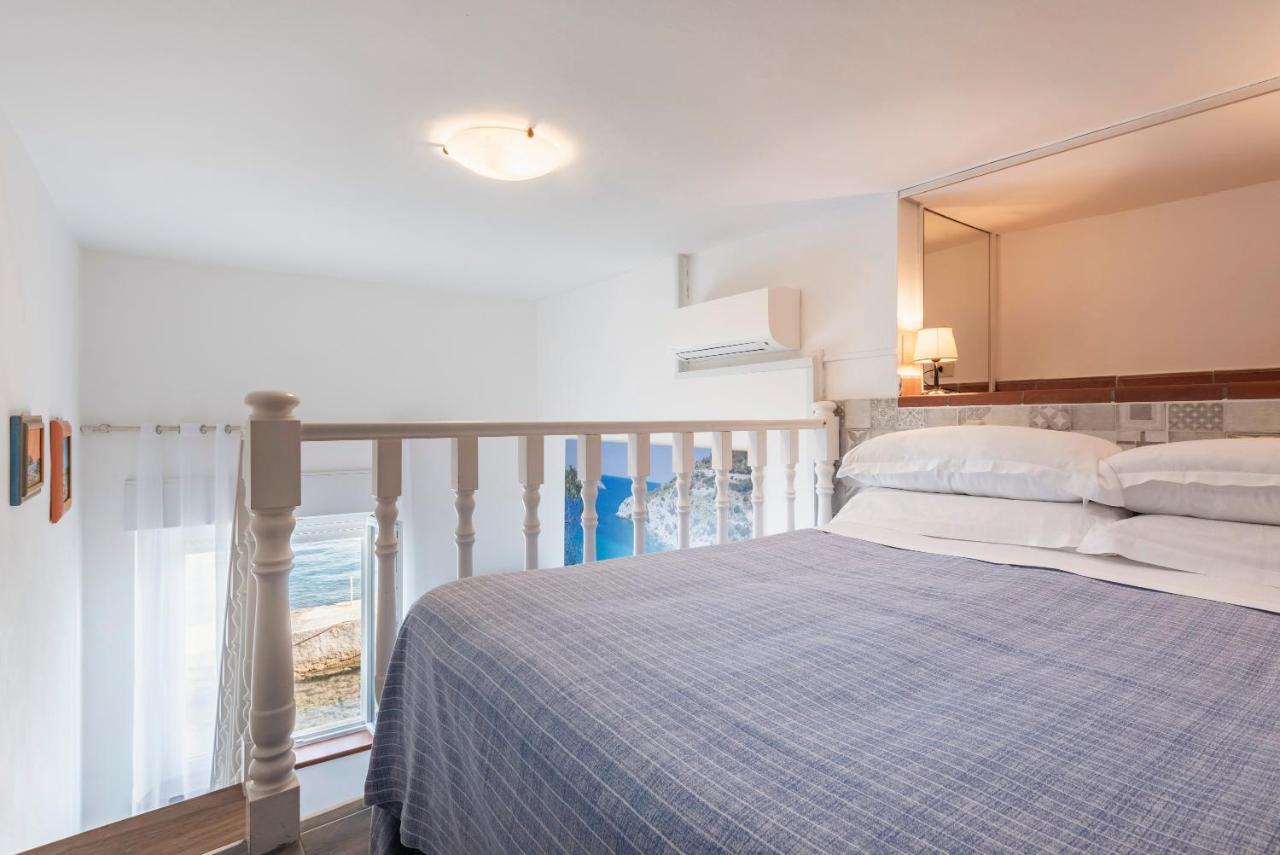 Hotel La Caletta Порто Санто Стефано Екстериор снимка