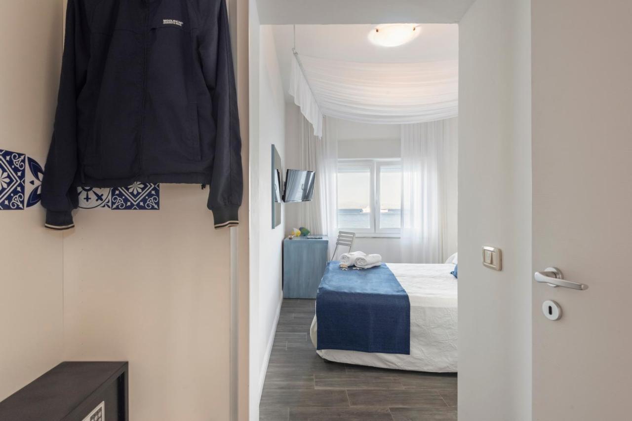 Hotel La Caletta Порто Санто Стефано Екстериор снимка