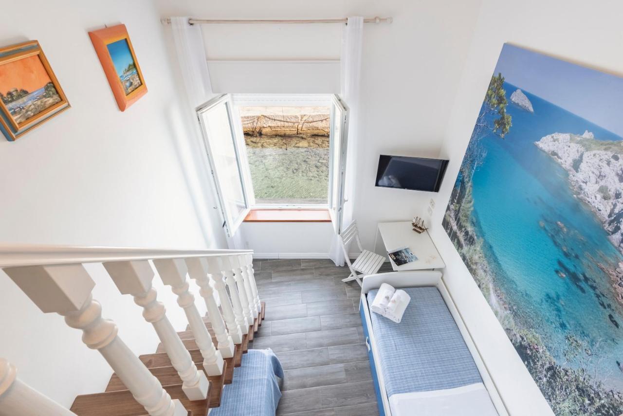 Hotel La Caletta Порто Санто Стефано Екстериор снимка