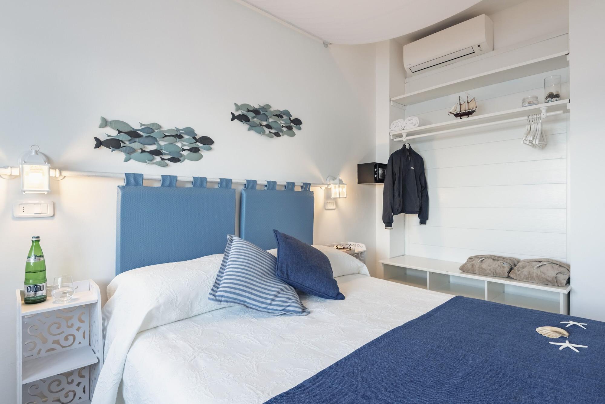 Hotel La Caletta Порто Санто Стефано Екстериор снимка