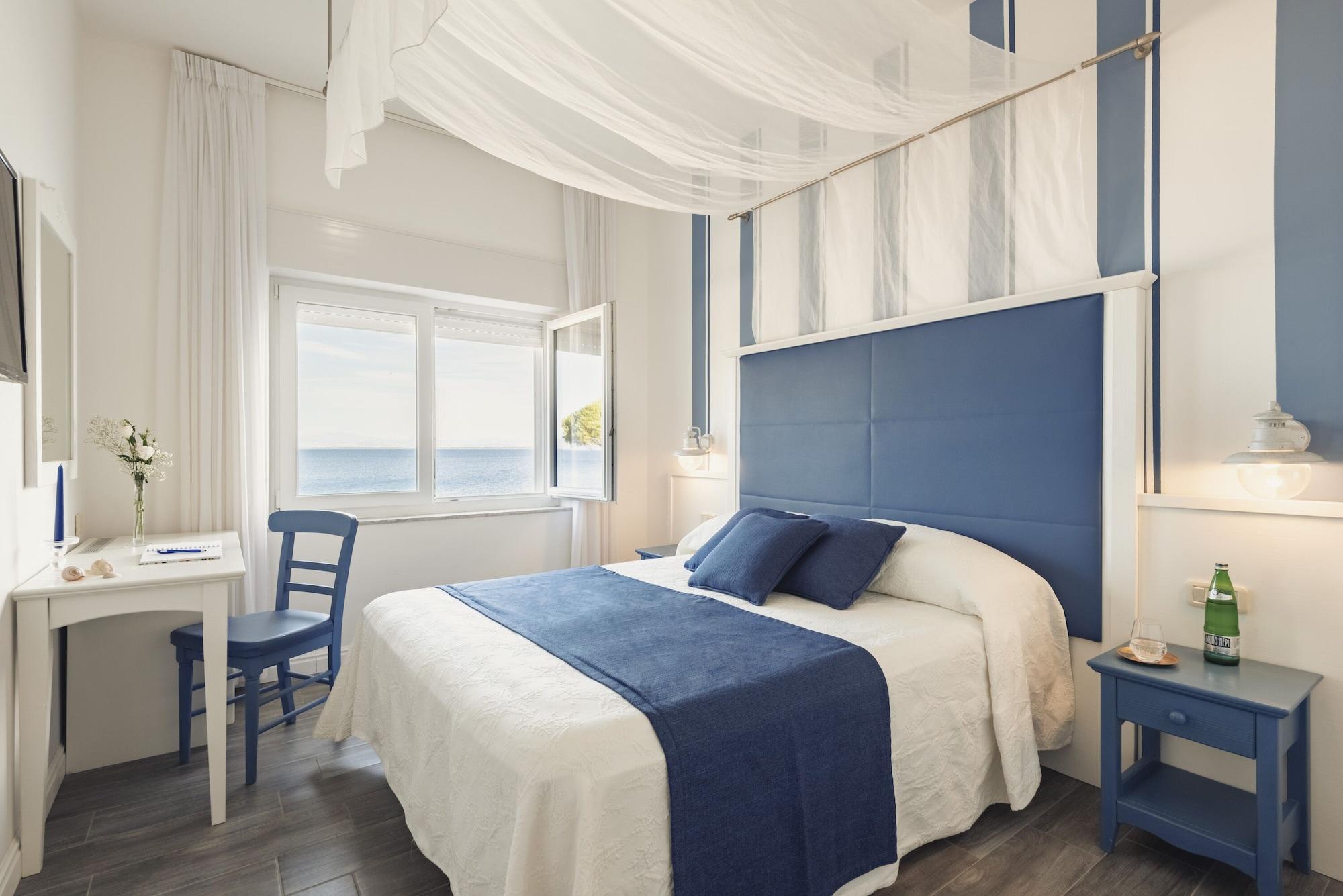 Hotel La Caletta Порто Санто Стефано Екстериор снимка