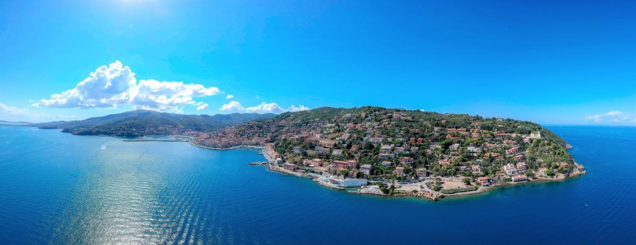 Hotel La Caletta Порто Санто Стефано Екстериор снимка